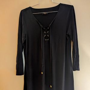 Black knit tunic with grommet v neck never worn